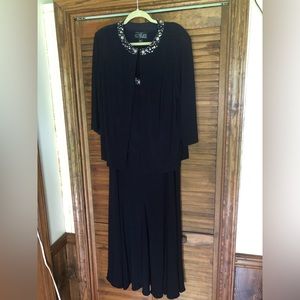 Stunning evening gown.  Never worn.  Smoke and pet free home. Tag still on dress